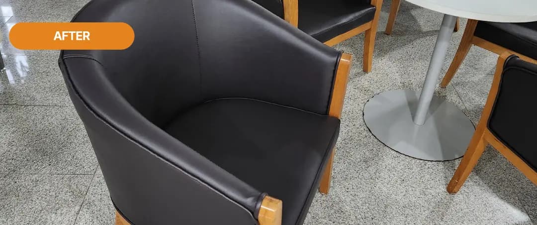 국립기상과학원 로비 1인 체어 천갈이 후 — 새 검정 가죽으로 교체된 체어